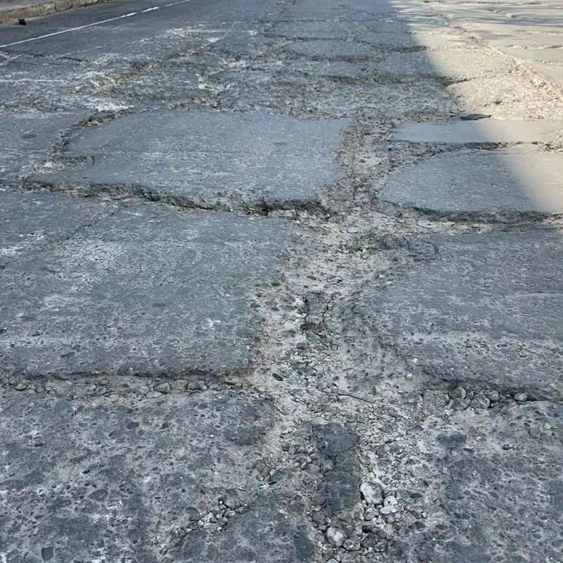 源汇路面起砂露石子修补料